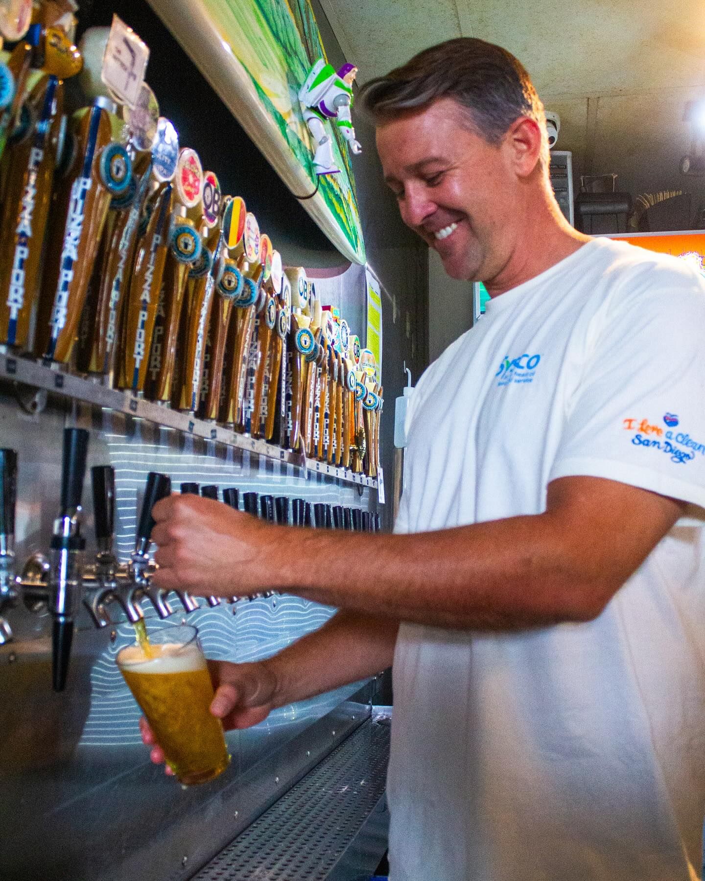 Fresh pint being poured at a Pizza Port tap